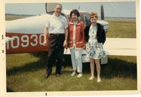 N1093C - My Mom and friend in front of our airplane sometime in the 1960's. - by William Rasor