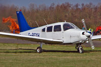 G-BGYH @ EGNU - Not quite what it looks like - this 1979 Piper PIPER PA-28-161, c/n: 28-7916313 is well away from the flames in the adjacent field