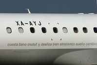 XA-AYJ @ EGGW - Titles on fuselage of 2010 Embraer ERJ-190-100ECJ, c/n: 19000243 - by Terry Fletcher
