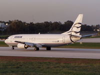 SX-BGR @ LMML - SX-BGR B734 just after landing - by raymond