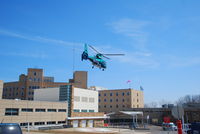 N365WM - West Michigan Air Care leaving Lakeland Hospital, Saint Joseph, MI, with patient bound for Bronson Hospital Kalamazoo. - by Mark Parren 269-429-4088