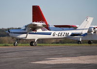 G-CEZM @ EGTF - Cessna 152 visiting Fairoaks. Ex N6167Q - by moxy