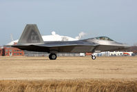 08-4168 @ LFI - USAF Lockheed Martin F-22A Raptor 08-4168 of the 94th FS Spads taxiing to the ramp after landing RWY 26. - by Dean Heald