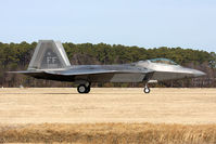 05-4085 @ LFI - USAF Lockheed Martin F-22A Raptor 05-4085 of the 94th FS Spads taxiing to the ramp after landing RWY 26. - by Dean Heald