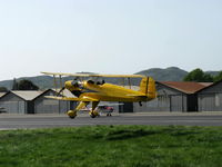 N1017U @ SZP - 1939 Bucker JUNGMANN C.A.S.A. 1.131, Lycoming O-360 180 Hp conversion, landing Rwy 22L grass - by Doug Robertson
