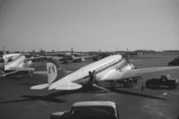 N31538 @ STL - Picture taken at St. Louis Lambert Field in 1955.  Note Delta C&S service truck in the foreground. - by Clarence Benitz