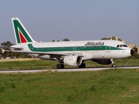 I-BIMD @ LMML - A319 I-BIMD Alitalia lining up for departure - by raymond