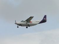 N763FE @ ONT - Straight in final for runway 26L - by Helicopterfriend
