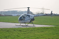 G-BYIE @ EGTB - Robinson R22 Beta at Wycombe Air Park - by moxy