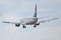 N305AW @ KORD - US AIRWAYS Boeing 737-3G7, AWE3 arriving from KPHX, on final RWY 28 KORD. - by Mark Kalfas