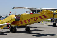 N71ZA @ KLAL - Nelson Burl ZENITH 701, c/n: 7-7186 on the wrong end of storm damage at 2011 Sun n Fun - by Terry Fletcher