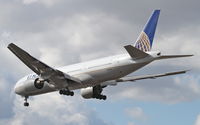 N224UA @ KORD - United Airlines Boeing 777-222, UAL836 arriving from ZSPD (Shanghai Pudong Int'l), on approach RWY 28 KORD. - by Mark Kalfas