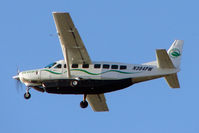 N304PW @ KATL - 2000 Cessna 208B, c/n: 208B0833 climbs away from Atlanta - by Terry Fletcher