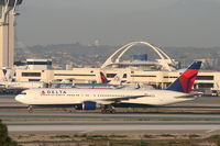 N143DA @ KLAX - Delta Airlines Boeing 767-332, off RWY 25L on TWY H. - by Mark Kalfas