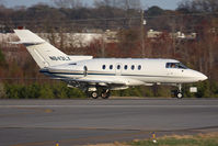 N843LX @ ORF - Oklahoma Garages LLC 1996 Raytheon Hawker 800XP N843LX from Southwest Florida Int'l (KRSW) rolling out on RWY 23 after landing.