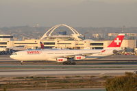HB-JMO @ KLAX - Swiss Airbus A340-313, SWR40 arriving from LSZH (Zurich-Kloten), on TWY H KLAX. - by Mark Kalfas