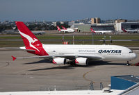 VH-OQE @ YSSY - pushback for 34R departure to LAX - by Bill Mallinson