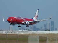 VH-VUE @ YMML - Virgin Blue Boeing 737 Victor Uniform Echo over the fence approaching runway 34 at Melbourbe (Tullamarine)