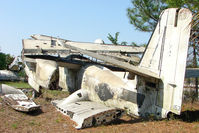 149856 - On the West Side of US-1 about 1 mile south of St.Augustine Airport FL - there is a grassed compound holding 9 x Ex Navy , Grumman Trackers - by Terry Fletcher