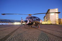 OE-XST @ 0000 - Linz Marathon Heli
parked in front of the Design Center - by Peter Pabel