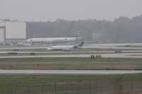 N405AW @ KCLT - Cloud cover less than 1000 AGL - by J.B. Barbour