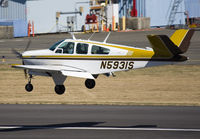 N5931S @ KRNT - Cute little Bonanza about to touch down on rwy 34. - by Philippe Bleus