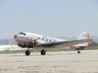 N17334 @ CNO - This particular aircraft has the distinction of being the oldest flying DC-3 in the world! With a range of 1300 nautical miles and a 143 knot cruise speed - by Helicopterfriend