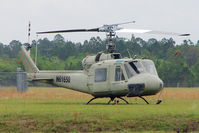 N61650 @ LCQ - 1997 Garlick Helicopters Inc HH-1K, c/n: 157184 - by Terry Fletcher