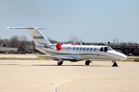 N509SB @ KDPA - Photographed through a chain-link fence.
