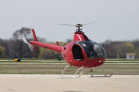 N806KS @ KDPA - Testing on the east ramp, photographed through the chain link fence