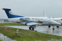 PP-UBS @ ISM - 2011 Embraer EMB-500 Phenom 100, c/n: 50000221 at Kissimmee - by Terry Fletcher