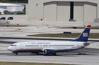 N427US @ KFLL - Boeing 737-400 - by Mark Pasqualino