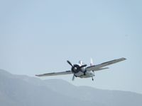 N5833 @ CCB - Making a wheel up pass while Navion N91707 taxi's off the runway