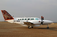 5H-WOW @ HTSN - Parked on the Seronera strip in safari country. Love the chocks!! - by Duncan Kirk