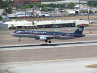 N179UW @ KPHX - One of the last of of dark blue 'Airways' planes landing on runway 26 at PHX