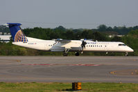 N354NG @ ORF - United Express (Colgan Air) N354NG (FLT CJC3325) from Newark Liberty Int'l (KEWR) rolling out on RWY 23 after landing.
