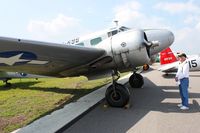 N7381C @ KLAL - A former AAF crewman reminiscing. On display at Sun N Fun 2011 - Lakeland, FL - by Bob Simmermon