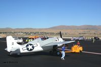 N86572 @ RTS - As seen from the firetruck celebrating Jon Gourley's win in the Saturday Biplane heat race. - by Nick Taylor Photography