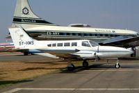 5Y-HWS @ FALA - Cessna 402B Businessliner [402B-0386] Lanseria~ZS 05/10/2003 .Seen here stored later scrapped. - by Ray Barber