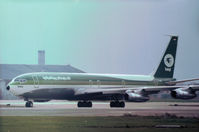 YI-AGG @ LHR - Boeing 707-370C of Iraqi Airways preparing to depart from Heathrow in November 1974. - by Peter Nicholson