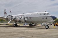 128424 @ NPA - 1951 Douglas C-118, c/n: 43207 in outside storage at Pensacola Naval Museum