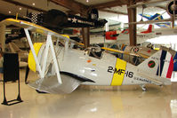 0976 @ NPA - 1937 Grumman F3F-2, c/n: 374 displayed at Pensacola Naval Museum . This aircraft ditched off the coast of Del Mar CA in 1940 - spent the next 50 years 1800 feet down in Pacific waters before being discovered and recovered in 1990 - The only original Grumm