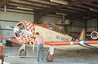 N711SQ @ ORL - SNJ-4 Texan of Rosie O'Grady's Flying Circus as seen at Herndon in November 1979. - by Peter Nicholson