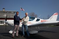 N126WK - accepting the keys for N126WK from John Rathmall - by Walter Eckmeier