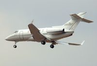 N900ST @ KSAT - Landing 12R - by RWB