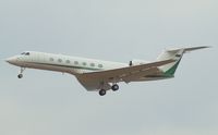 N550JD @ KSAT - Landing 12R - by RWB