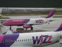 HA-LPO @ EGGW - Taken on a wet February morning at Luton whilst waiting to fly to Cyprus - by Steve Staunton