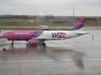 HA-LPK @ EGGW - Taken on a wet February morning at Luton whilst waiting to fly to Cyprus - by Steve Staunton