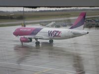 HA-LPK @ EGGW - Taken on a wet February morning at Luton whilst waiting to fly to Cyprus - by Steve Staunton