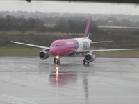 HA-LPC @ EGGW - Taken on a wet February morning at Luton whilst waiting to fly to Cyprus - by Steve Staunton